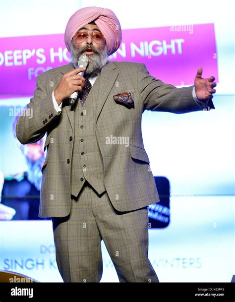 Hardeep Singh Kohli comedian on stage Stock Photo - Alamy