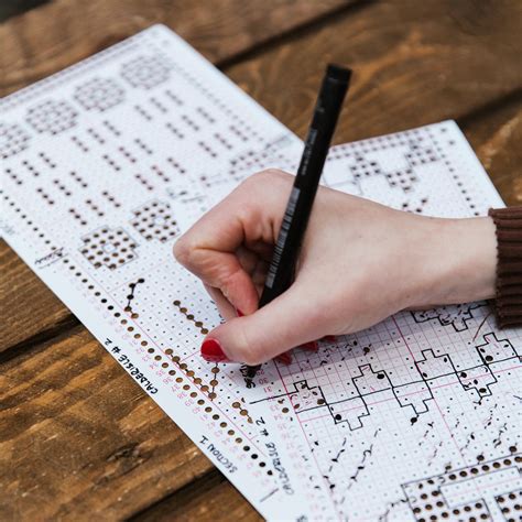 Learn to punch your own machine knitting punchcards