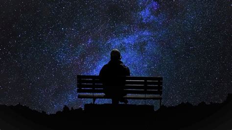 Man Is Sitting Alone On Bench Under Starry Sky During Nighttime HD ...