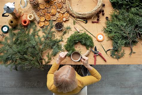 "Christmas Wreath Workshop" by Stocksy Contributor "Clique Images ...