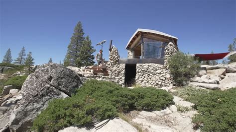 His Amazing Mountaintop DIY Tiny Rock Cabin