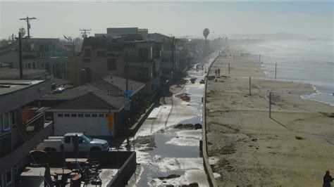 Rushing waves flood coastal areas of San Diego County after a powerful ...