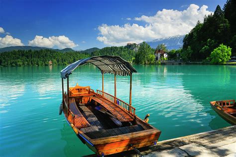 Traditional Pletna Boat On Lake Bled Photograph by Johnathan Ampersand ...