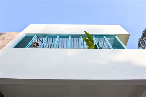 blue louvres, louvres, white facades, windows, balcony, terraces ...