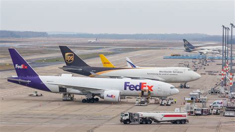 File:Fedex, Boeing 777F, N856FD and UPS, Boeing 747-400F, N574UP ...