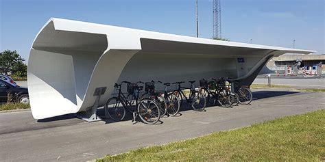 denmark is repurposing discarded wind turbine blades as bike shelters