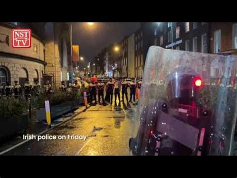 Unrest erupts following stabbing in Dublin that left five injured - YouTube