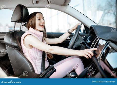 Sports woman driving a car stock image. Image of smile - 143335441