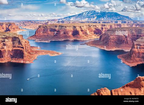 Houseboats on Lake Powell, Utah with Navajo Mountain in the background ...