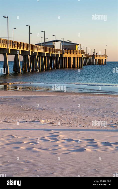 Gulf State Park fishing pier at dusk on the beach of Gulf Shores ...