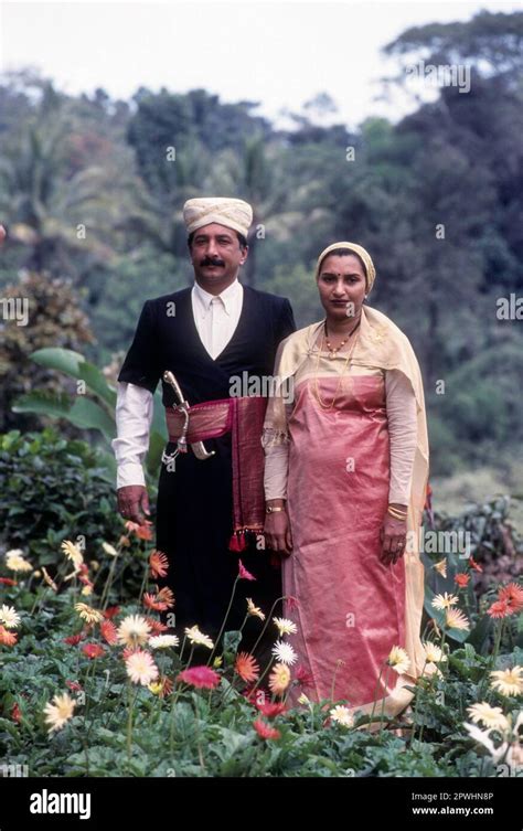 Kodava couple in their traditional dress at Madikeri, Mercara in Kodagu ...