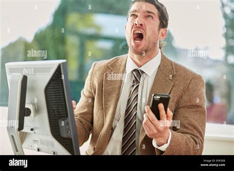 Man stressed out at work Stock Photo - Alamy