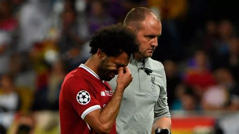 Mohamed Salah in awkward exchange with Sergio Ramos as he hugs old ...