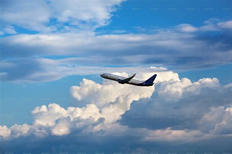 Airplane In The Clouds - Stock Photos | Motion Array