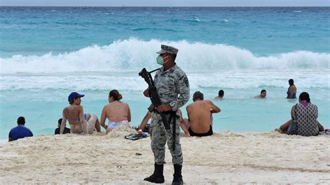 Four killed near Mexico's Cancun beach resorts; suspects arrested