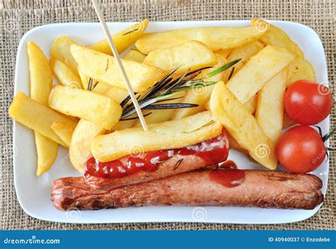 Chips and sausages stock image. Image of sauce, potatoes - 40940037