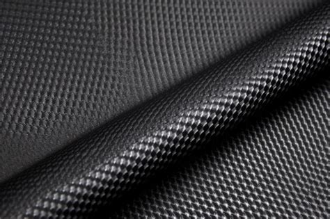 Premium AI Image | Carbon fiber material on mousepad