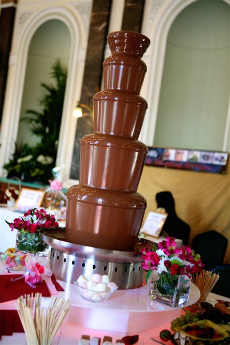 a large chocolate fountain sitting on top of a table