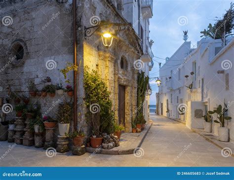 Monopoli - the Old Town Aisle with the Little Chapel at Dusk Stock ...