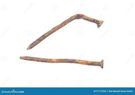 2 Rusty Iron Nails stock photo. Image of metal, inside - 91775594