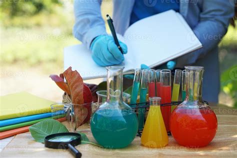 Science experiment, colorful liquid substaance in transparent test ...