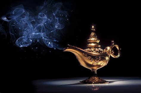 Magic Aladdin's Genie lamp on black with smoke - Radha Krishna Temple ...