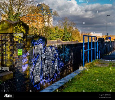 Graffiti in a city alleyway Stock Photo - Alamy