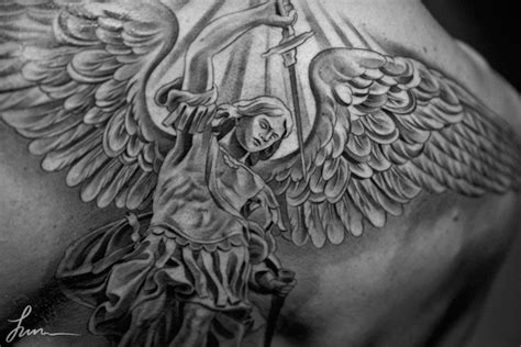 43 Heavenly Angel Tattoo Designs - TattooBlend