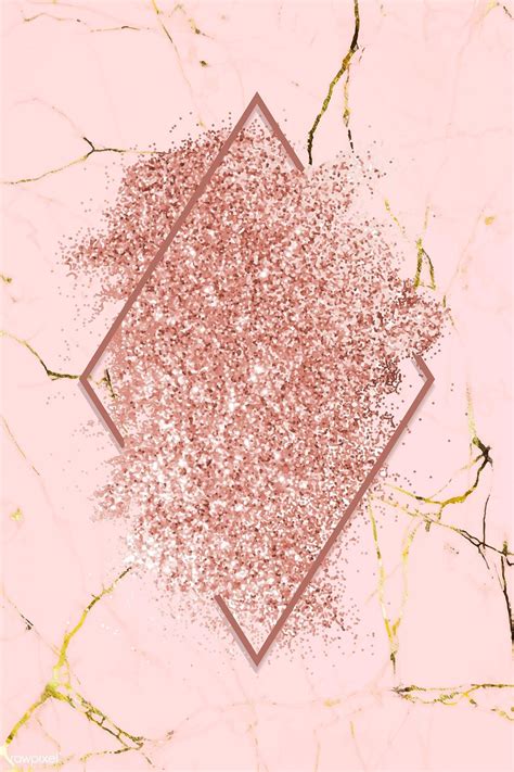 Pink gold glitter with a brownish red rhombus frame on a pink marble ...