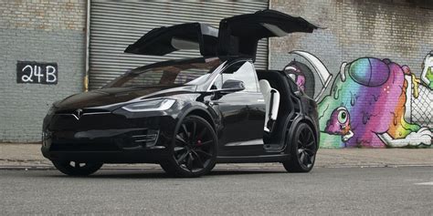 Tesla's Silly Falcon Wing Doors Have One Great Function | Tesla suv ...