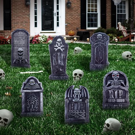 Create a creepy graveyard halloween decorations for a bone-chilling scene