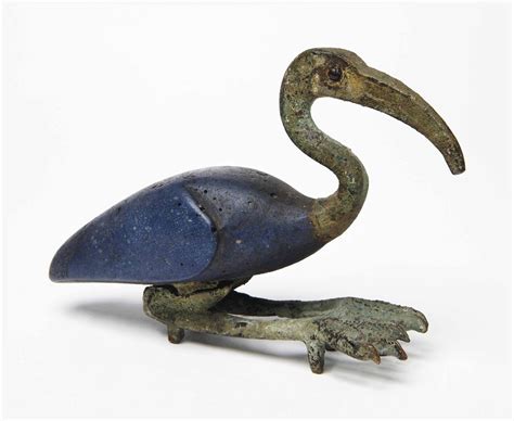 AN EGYPTIAN BLUE GLASS AND BRONZE - IBIS, PTOLEMAIC PERIOD, CIRCA 332 ...