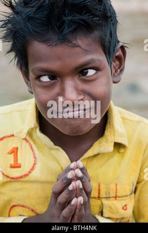 Young poor Indian boys pulling a funny faces and laughing. India Stock ...