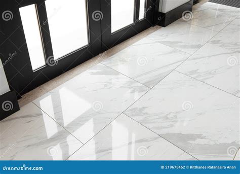 Marble Floor Tiles in the Glass Door Stock Photo - Image of glass ...