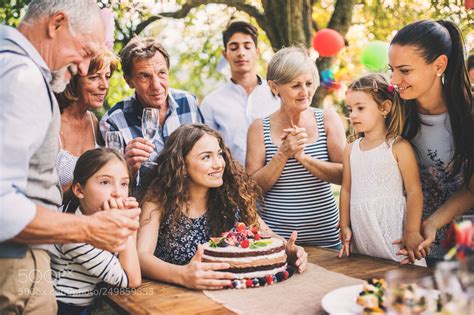 Family celebration or a garden party outside in the backyard. by ...