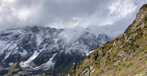 Slope of a Snow Covered Mountain with Peaks Hidden in the Cloud · Free ...