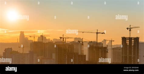 Construction site with cranes Stock Photo - Alamy