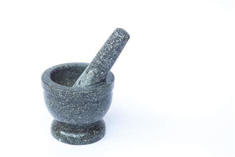 Stone mortar and pestle with copy space 1819613 Stock Photo at Vecteezy