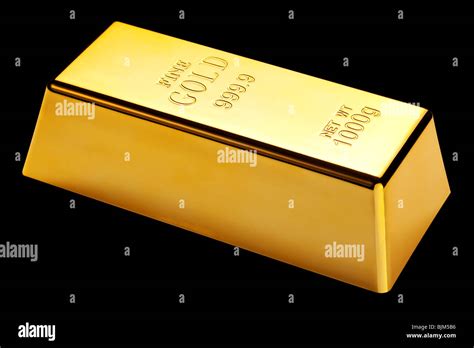 Photo of a 1kg gold bar isolated on a black background Stock Photo - Alamy