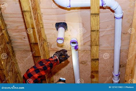 Plumbing Building Contractor Installing Plastic Drain Pipe the Custom ...