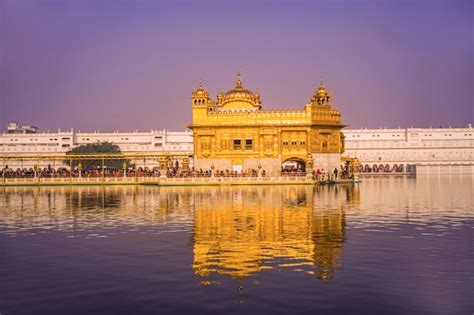 Premium Photo | Reflection of golden temple in water