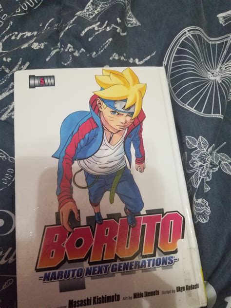 Why does the front of the manga cover have Boruto in a different color ...