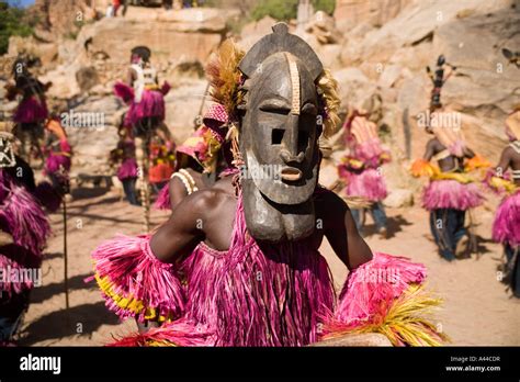 Dancers at the mask dance in the village of Tereli, Dogon Country, Mali ...