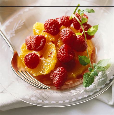 Raspberry and Orange Fruit Salad in a … – License Images – 657997 StockFood