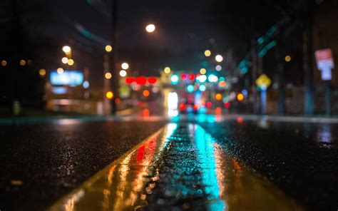 road-asphalt-rain-night-lights-light-street-bokeh-close-up - Nassau Weekly