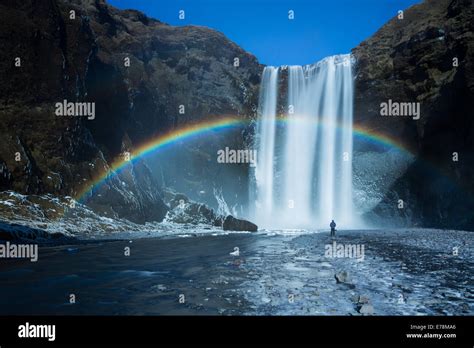 a rainbow at Skógafoss, southern Iceland Stock Photo - Alamy