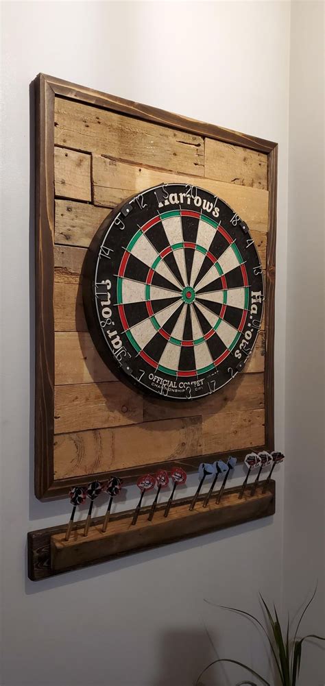 Custom dartboard backing and dart holder I made. Just used cedar and ...