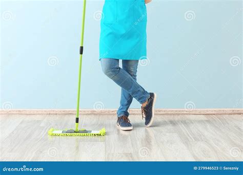 Male Janitor with Floor Mop Indoors Stock Image - Image of color, blue ...