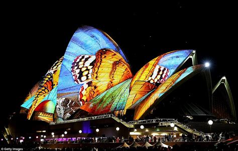 Sydney Opera House transforms into giant snake in stunning Vivid ...