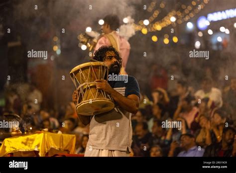 Ganga aarti, Portrait of an young priest performing river ganges ...